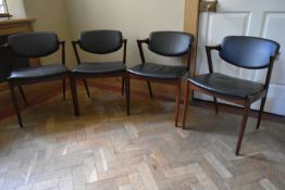 A set of four Model 42 dining chairs by Kai Kristiansen, recovered in black leather. (with