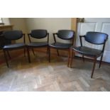 A set of four Model 42 dining chairs by Kai Kristiansen, recovered in black leather. (with