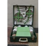 A 1960's vintage picnic set by Brexton, complete and in fitted carrying case. H.14 W.40 D.40cm