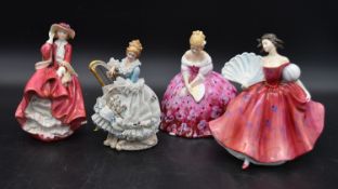 Three Royal Doulton female figures and another similar figure. H.23cm