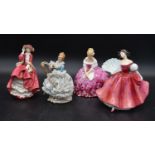 Three Royal Doulton female figures and another similar figure. H.23cm