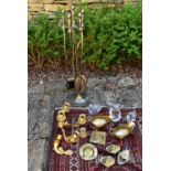 A brass fire companion set and various items of brassware along with three items of Art Glass. H.