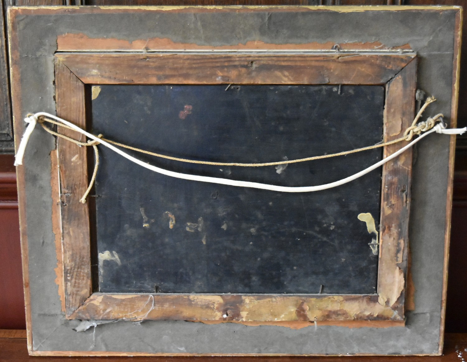 An early 19th century gilt framed oil on tin, figures by a bridge in a rural village setting with - Image 3 of 3