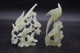 Two Chinese carved and pierced jade figure groups of song birds among blossom and foliage. One