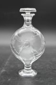 A Lalique frosted glass 'Moulin Rouge' floral design perfume bottle with stopper. Signed Lalique,
