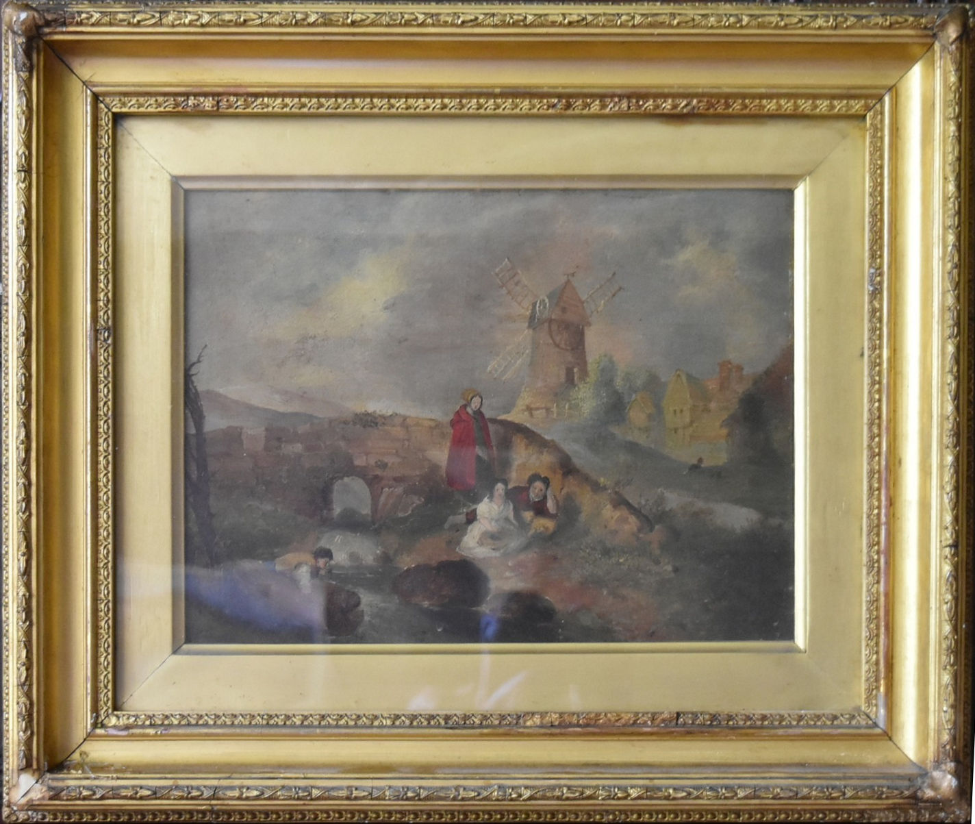 An early 19th century gilt framed oil on tin, figures by a bridge in a rural village setting with - Image 2 of 3