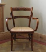 A 19th century bentwood armchair stamped J & J Kohn to the underside. H.80cm W.60cm