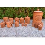An extensive set of lidded terracotta kitchen jars, The Original Suffolk Canister by Henry