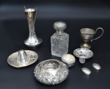 A collection of silver to include an English hallmarked silver waisted vase and a pierced dish as