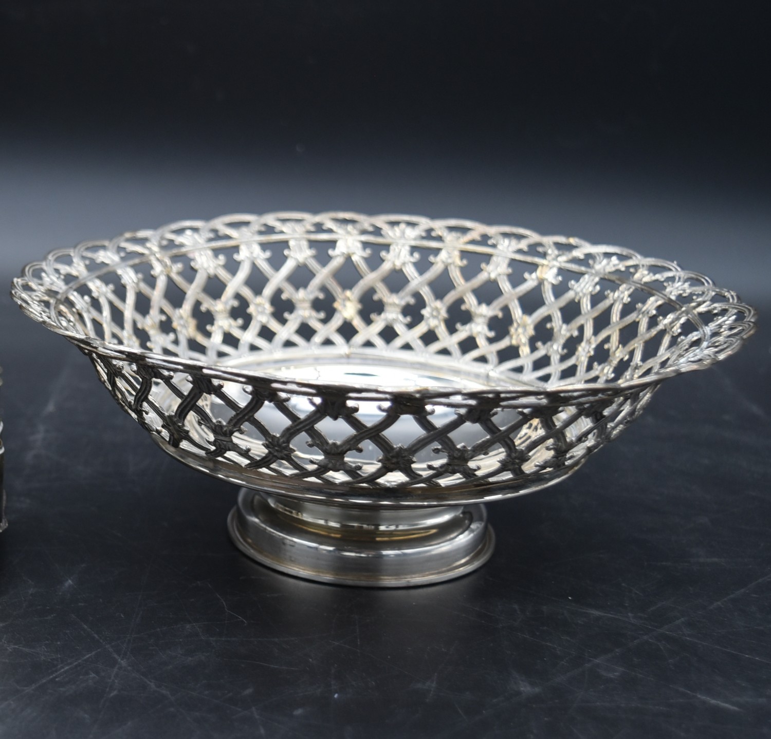 A pierced and engraved floral design Italian silver pedestal bowl with round foot. Maker UnoAErre,