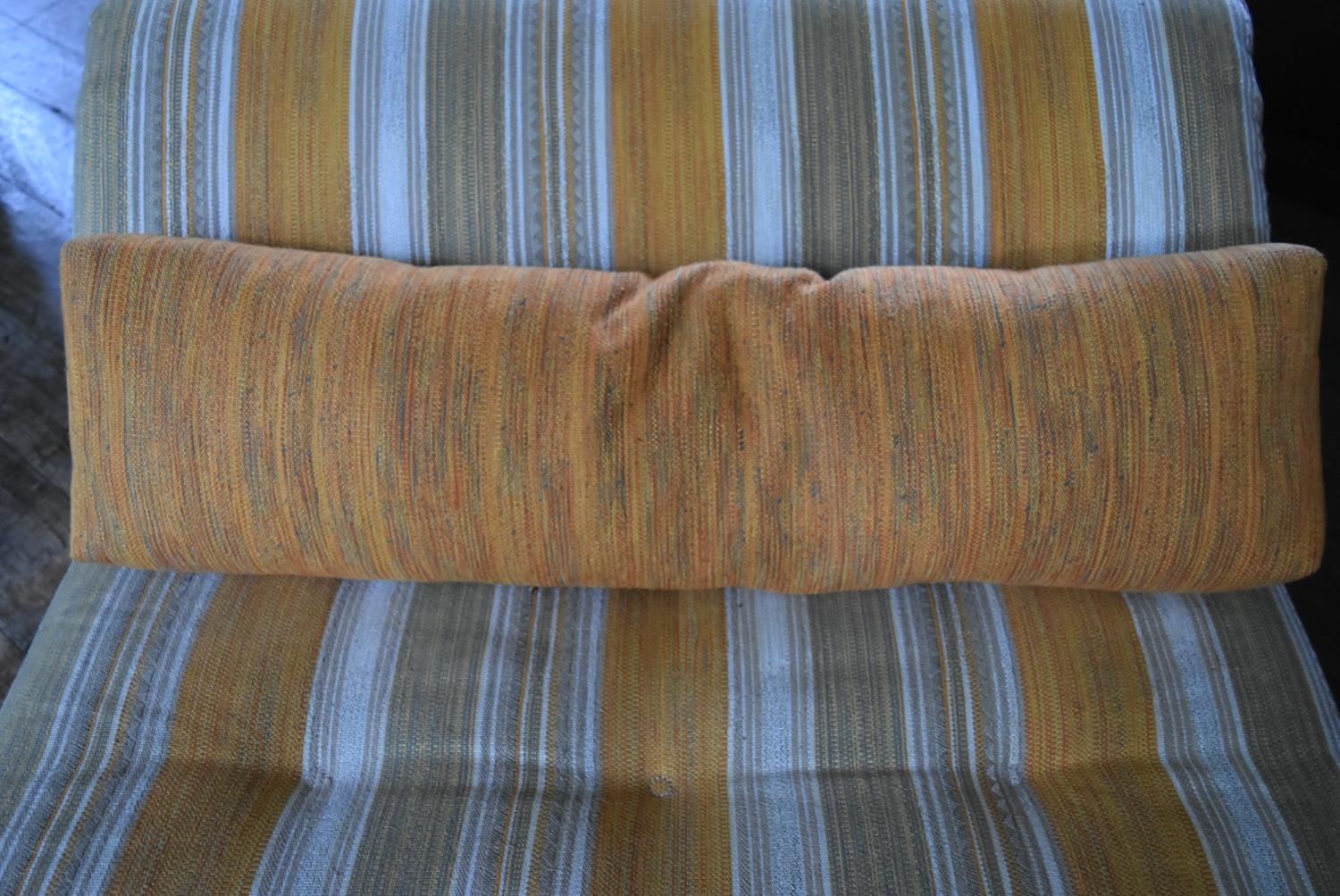 A Roche Bobois chaise in soft candy stripe buttoned upholstery with bolster cushion. H.60 L.140 W. - Image 5 of 5