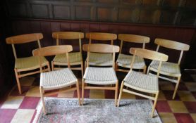 Hans Wegner for Carl Hansen & Son, a set of eight teak dining chairs model CH23 on restrung corded