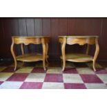 A pair of French style walnut quarter veneered and crossbanded side tables with plate glass tops