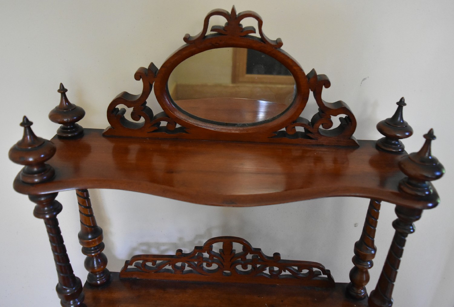 A Victorian rosewood four tier whatnot with pierced carved and mirrored back on turned supports. H. - Image 4 of 5