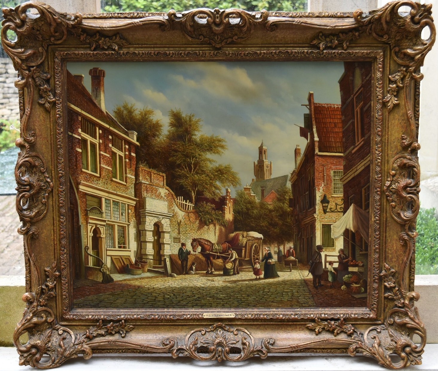 Pieter Cornelius Steenhouwer (1896-1972) a gilt framed oil on panel, Flemish street scene with - Image 2 of 5