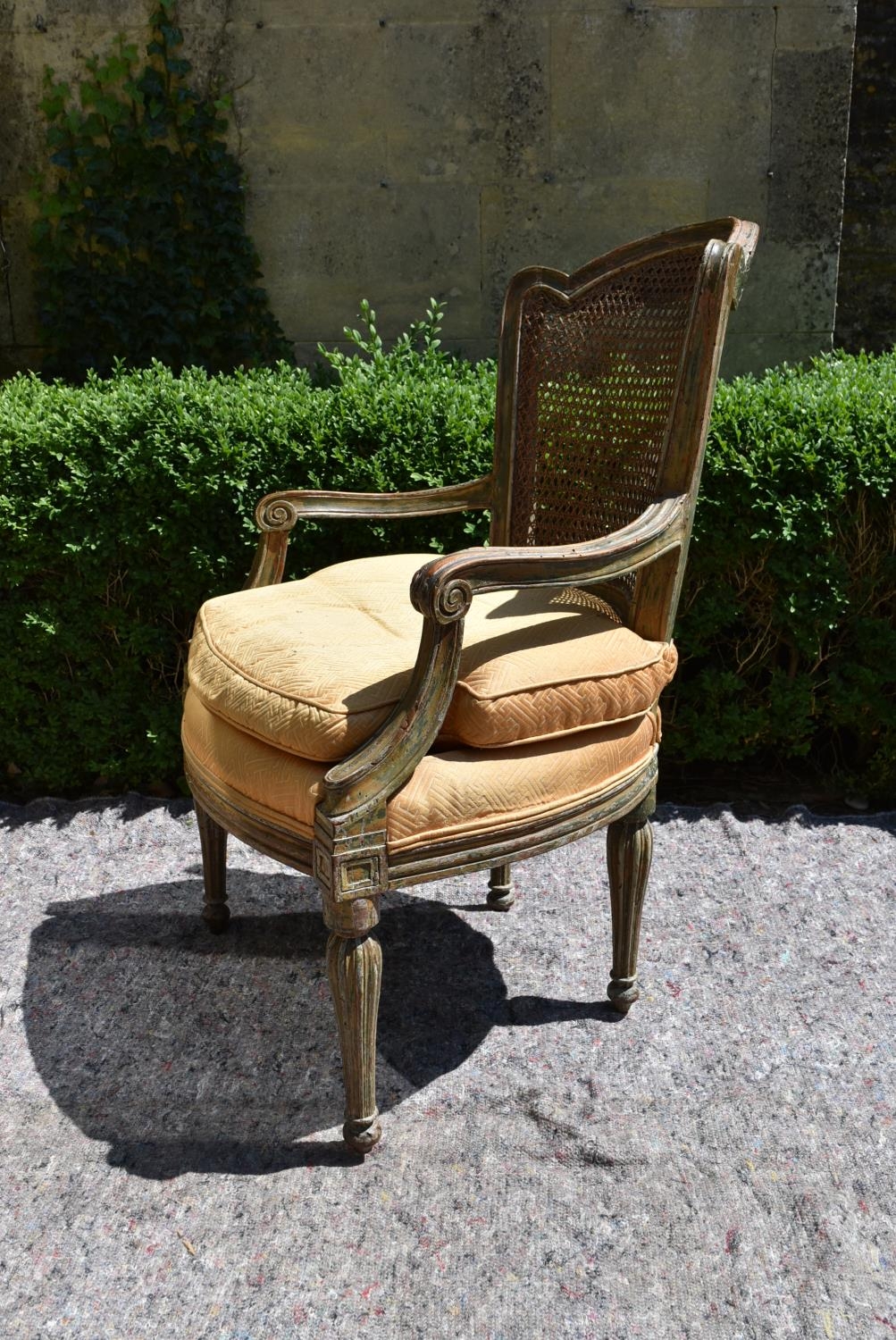 A Continental style painted and caned back armchair with fitted squab cushion raised on shaped - Image 3 of 6