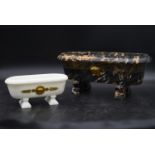 Two Versace Empire style faux marbles petits bains each with the Medusa mask motif. H.18cm W.40cm