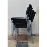 a set of four modern moulded stacking chairs on metal tubular bases. H.76 W.40 D.45cm