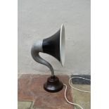 A table lamp converted from a 1920's gramaphone speaker in aluminium and bakelite. H.62cm