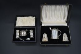 A cased silver cruet, mustard pot and spoon and salt and pepper shakers, CBrs for Clifford Brothers,