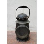 A vintage railwayman's metal cased signal lantern. H.32cm