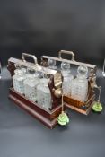 A 19th century silver plated and mahogany cased three bottle locking tantalus and a similar faux