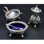 A Mappin and Webb silver mustard pot and salt each with original spoons and a matching pepper shaker