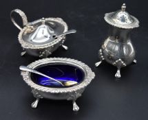 A Mappin and Webb silver mustard pot and salt each with original spoons and a matching pepper shaker