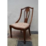 An Edwardian mahogany and satinwood salon chair with inlaid back splat and drop in seat on square