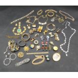 A large collection of vintage and costume jewellery. Including brooches, bracelets, necklaces, rings