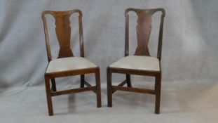 A pair of mid Georgian style mahogany side chairs with drop in seats on square moulded supports. H.