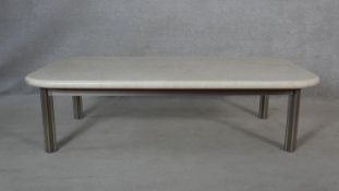 A contemporary marble topped coffee table on metal tubular supports. H.40 L.142 W.76cm