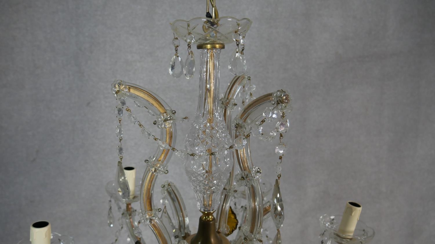 A vintage gilt metal and glass six branch chandelier with crystal drops and swags. W.60cm - Image 2 of 6