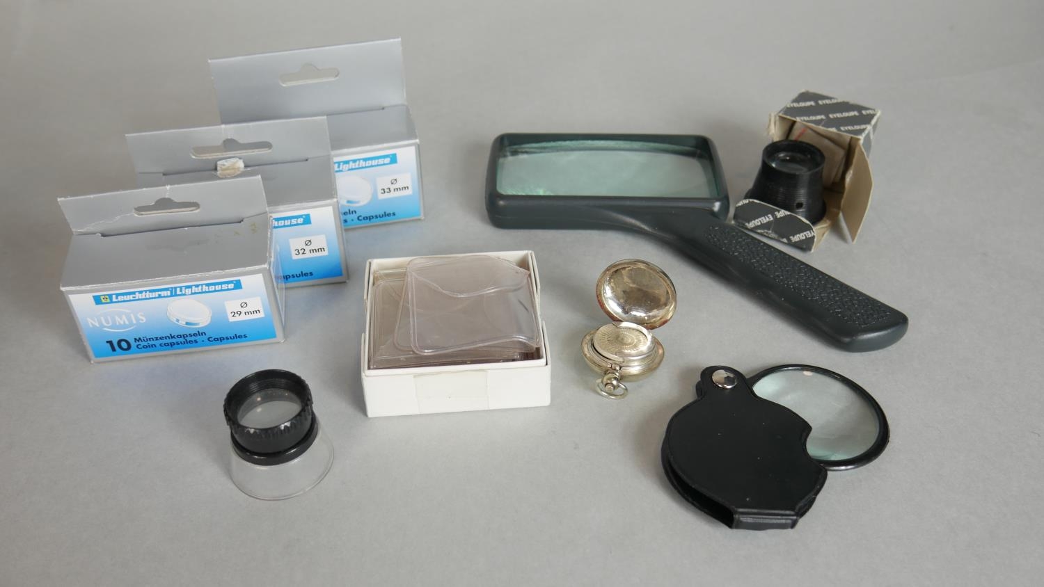 A collection of various coin collectors tools and storage cases. Including capsules, wallets, - Image 7 of 7