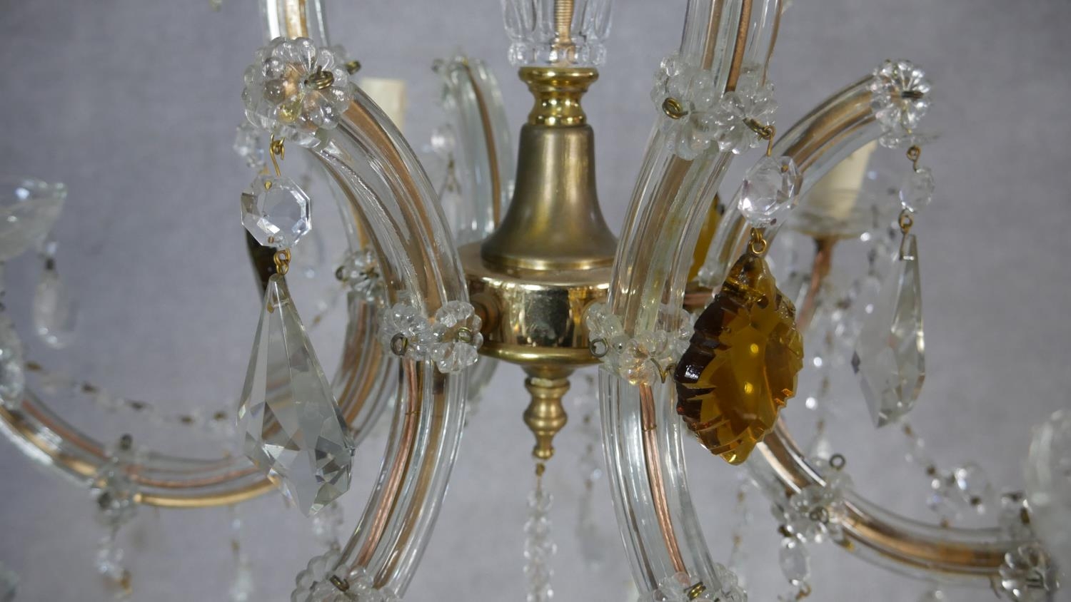 A vintage gilt metal and glass six branch chandelier with crystal drops and swags. W.60cm - Image 5 of 6