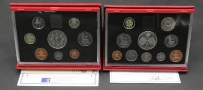 A 1993 Royal Mint deluxe proof set in plastic case in padded red leather wallet along with a 1997