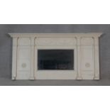 A 19th century Adam style overmantel mirror with dentil cornice with swag decoration above central