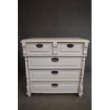 A late 19th century white painted Continental chest of two short over three long drawers. H.