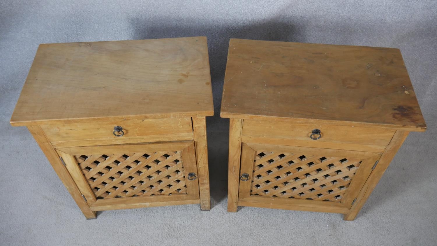 A pair of Eastern hardwood bedside cabinets with frieze drawers above lattice panelled cupboard - Image 5 of 5