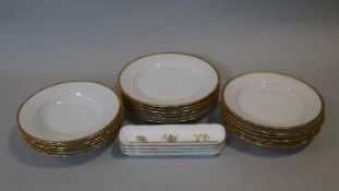 A collection of porcelain plates. Including a set of six of three different sizes of plates by