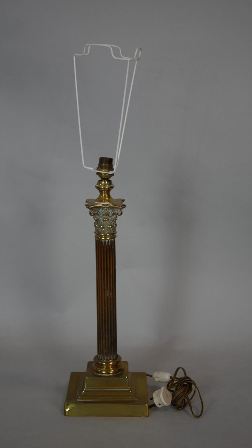 A brass Corinthian column table lamp base and an Eastern style brass table lamp and shade. H.51cm ( - Image 5 of 8