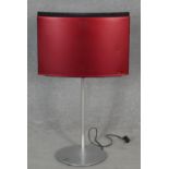 A red Bang and Olufsen BEOSOUND 1 CD/radio with floor stand and cables. Plug is missing earth pin.