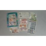 A collection of various world and British notes. Including a Bank of England Beale white five-