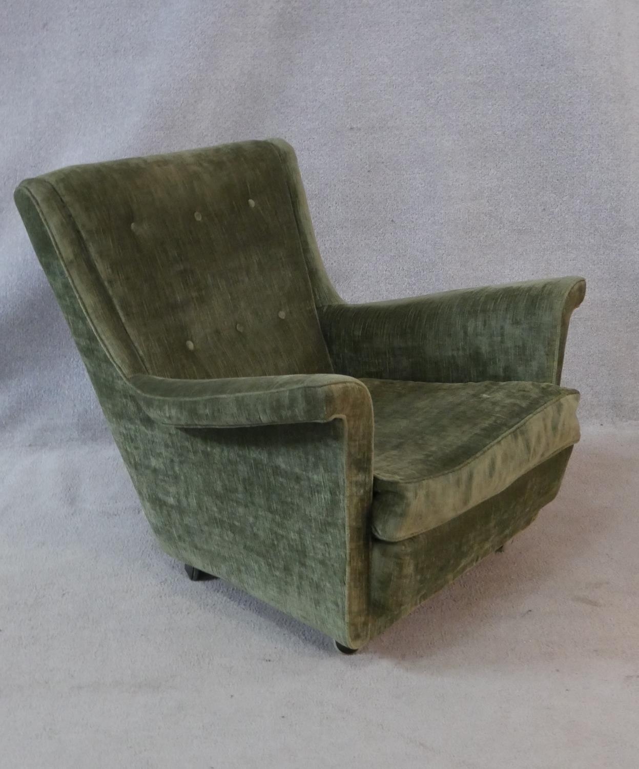 A mid century vintage armchair in buttoned upholstery. H.77 W.78 D.81cm - Image 2 of 4