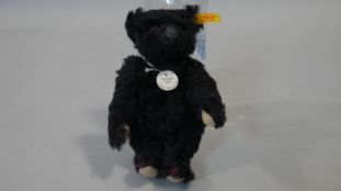 A historic Steiff miniatures VIII: 1912 Teddy Bear Schwarz (black) with certificate of