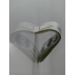 A photographic print on acrylic by Israeli artist Boaz Aharonovitch, heart made from dollar notes.