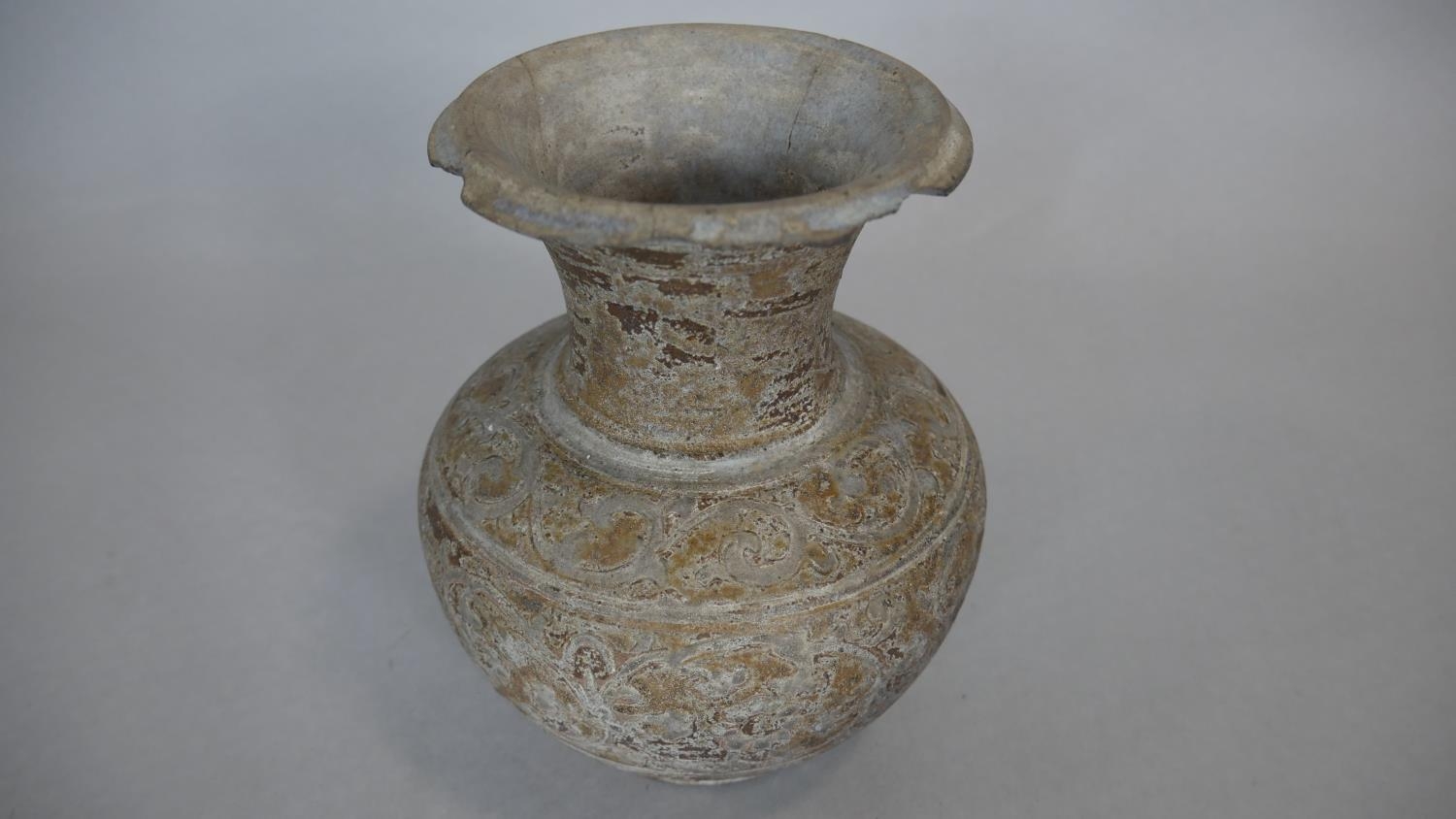 An Oriental ceramic glazed flared neck vase with stylised floral design. H.16.5cm - Image 2 of 6