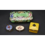 A collection of trinket and pill boxes. Including a Limoges hand painted yellow porcelain box with