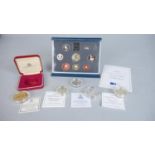 Five coins and a proof set, including a cased 22ct gold plated on silver coin with St Paul's