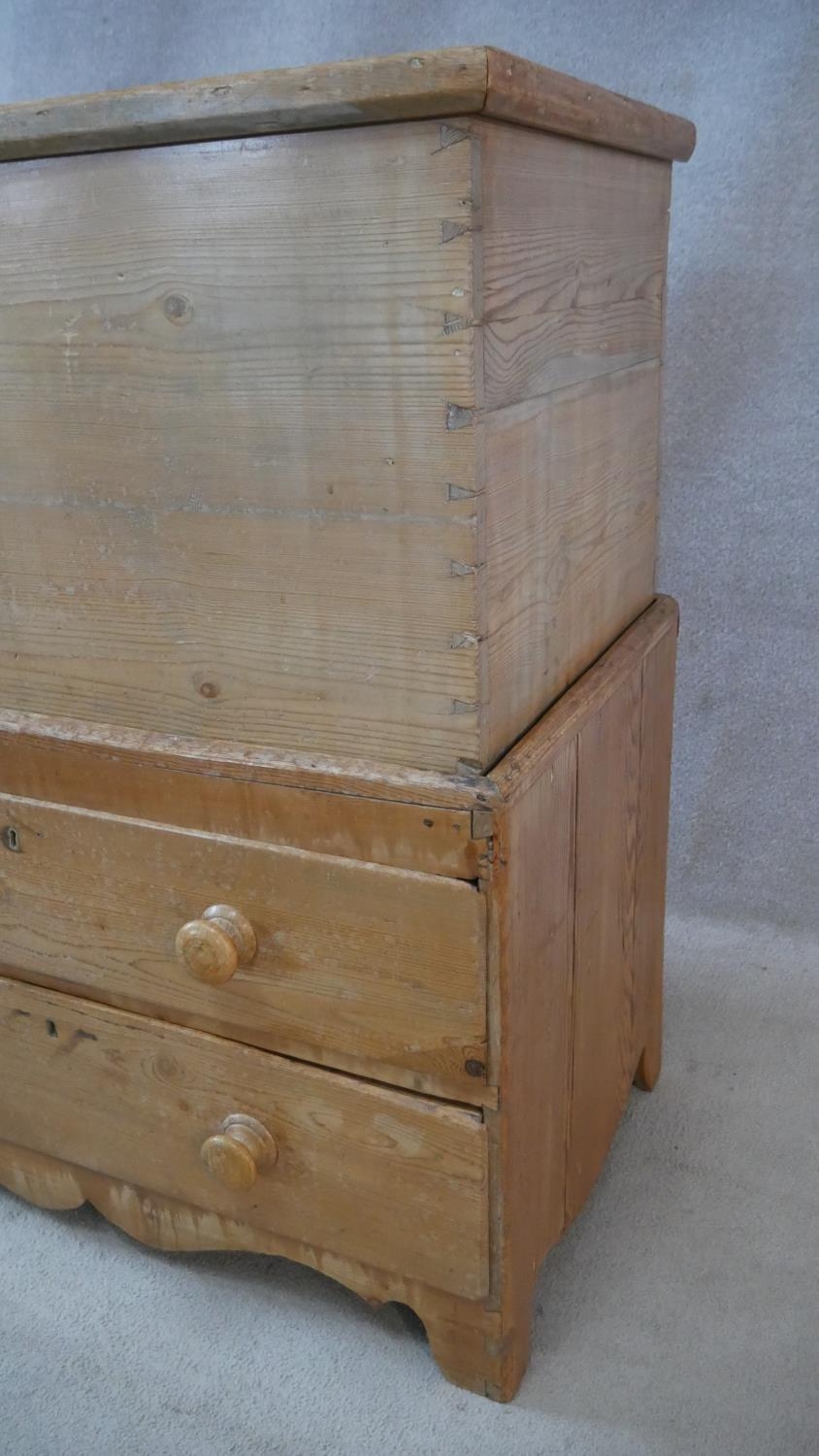 A 19th century pine mule chest with lidded coffer section fitted with candle slide above two drawers - Image 3 of 6